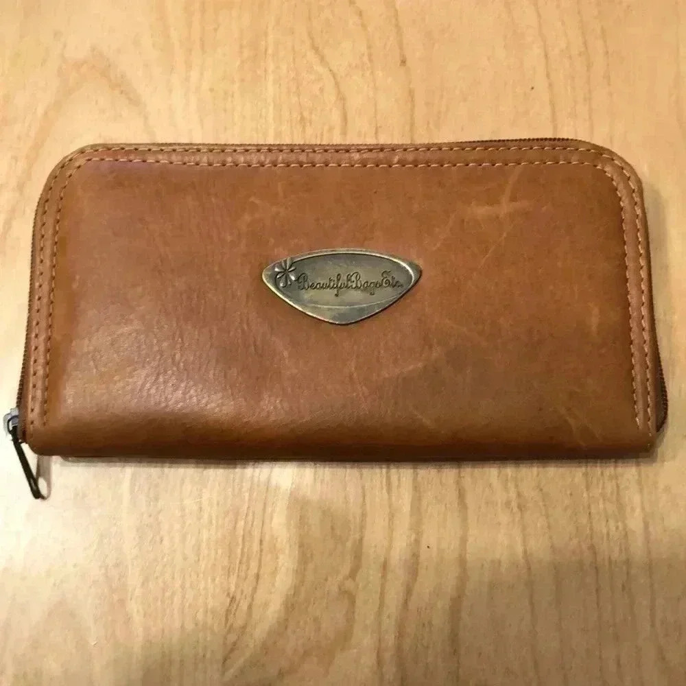 Beautiful Bags Etc. caramel brown leather wallet.  Accordion style with zipper.